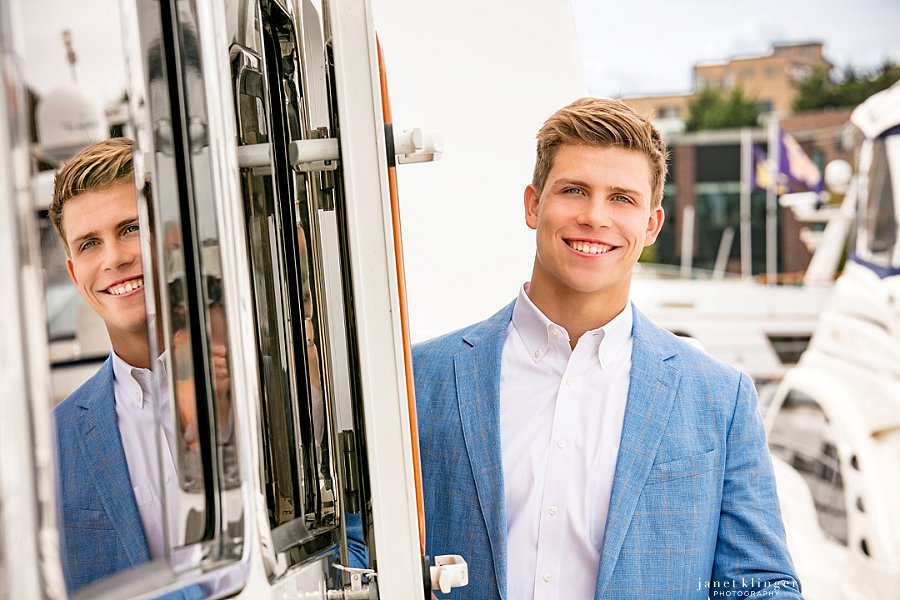 handsome inside and out, senior pictures on family boat in Seattle